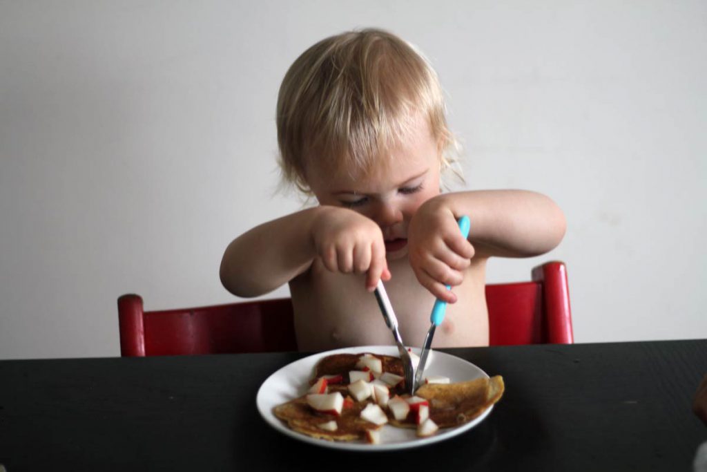 Rustic sourdough pancakes make a delicious and nourishing breakfast for this little guy.